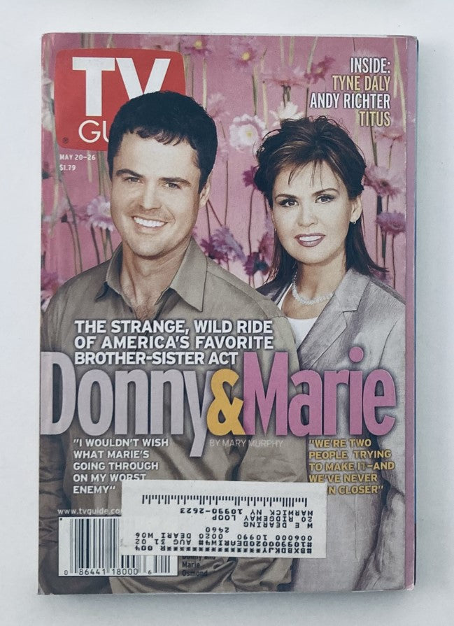 TV Guide Magazine May 20 2000 cover featuring Donny and Marie Osmond, showcasing their iconic brother-sister act with vivid floral background.