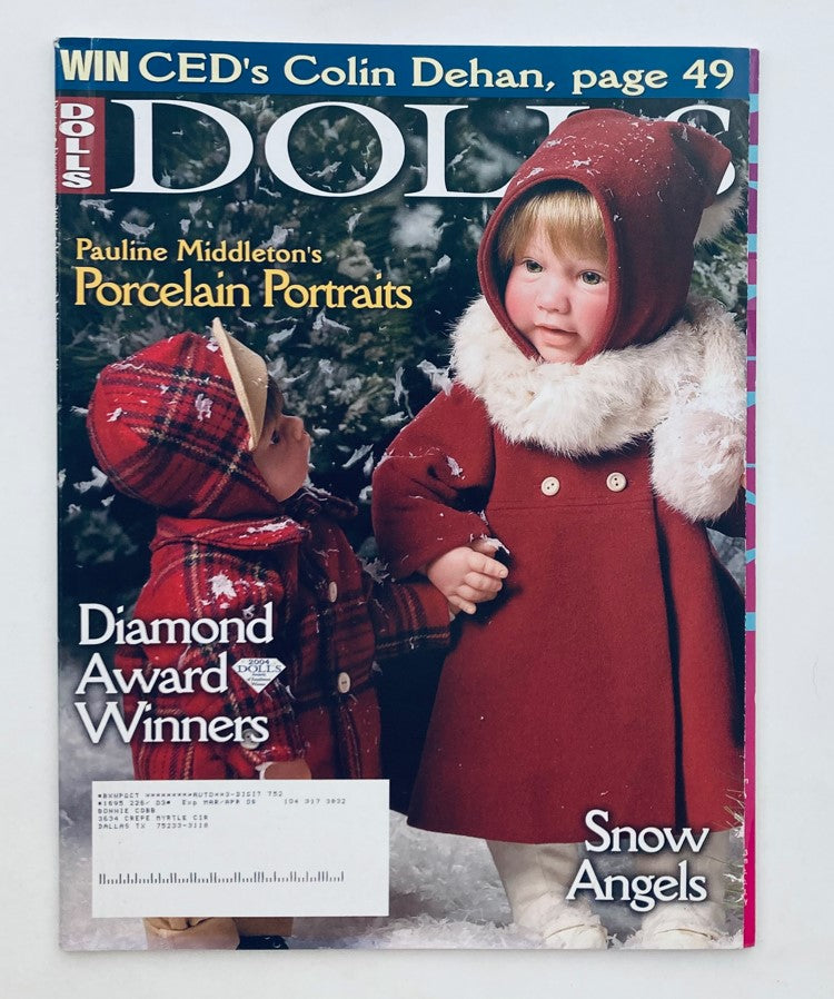 Cover of Dolls Magazine December 2004 Vol 23 #10 featuring Paulie Middleton's Porcelain Portraits showcasing two children in winter attire.