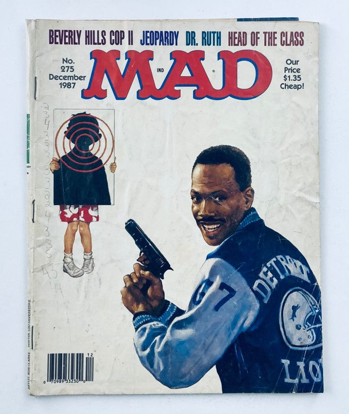 Cover of Mad Magazine December 1987 No. 275 featuring Eddie Murphy, showcasing a humorous depiction with a playful scene, reflecting the iconic style of 80s pop culture.