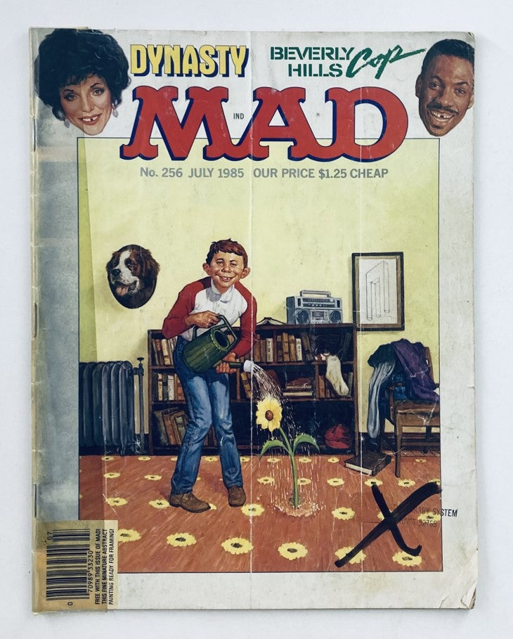 Cover of Mad Magazine July 1985 No. 256 featuring themes from Dynasty and Beverly Hills Cop with humorous illustrations.