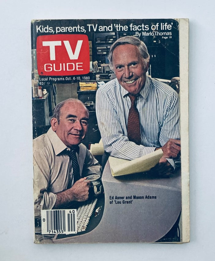 TV Guide Magazine from October 4, 1980 featuring Mason Adams and Ed Asner on the cover, showcasing their connection to the show 'Lou Grant', with a background related to television and parenting.