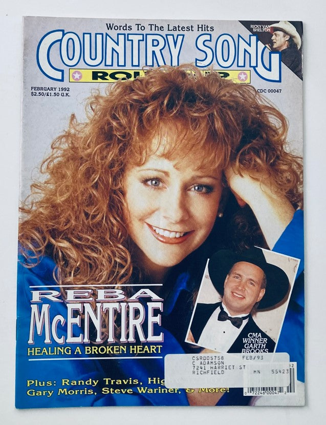Cover of Country Song Roundup Magazine from February 1992 featuring Reba McEntire and Garth Brooks, highlighting the theme of 'Healing a Broken Heart'. The magazine showcases vibrant country music culture and notable artists of the early '90s.