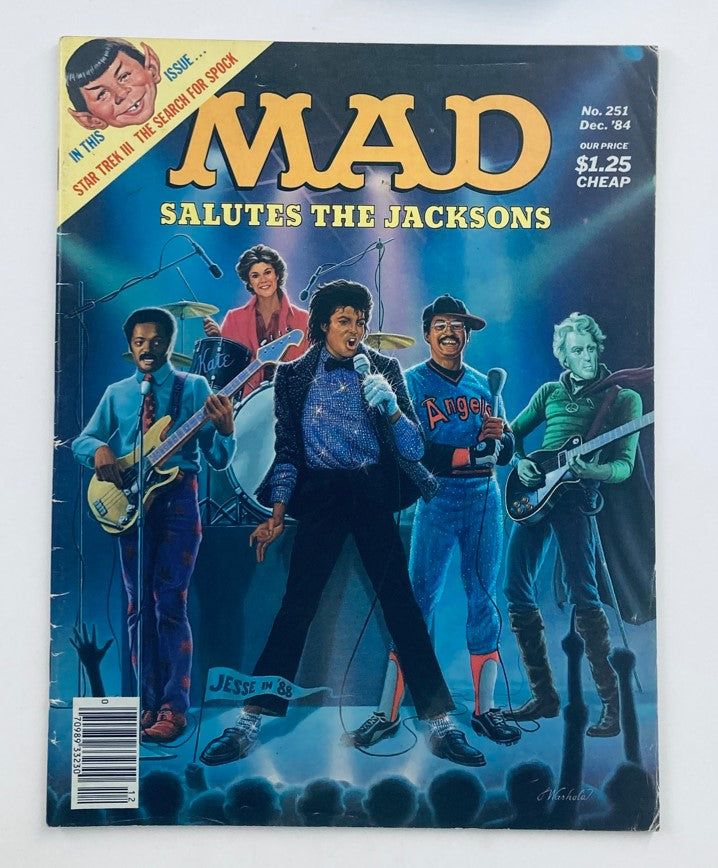 Mad Magazine December 1984 No. 251 featuring the Jacksons on the cover. This vintage magazine showcases a vibrant illustration of a musical performance with characters resembling pop culture icons, highlighting an entertaining blend of humor and nostalgia.