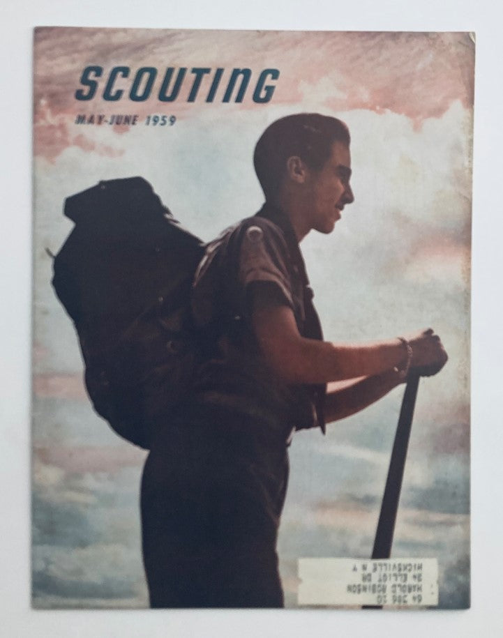 Cover of VTG Scouting Magazine May 1959 Vol 47 No. 5 featuring a scout carrying a backpack and a staff against a dramatic sky.