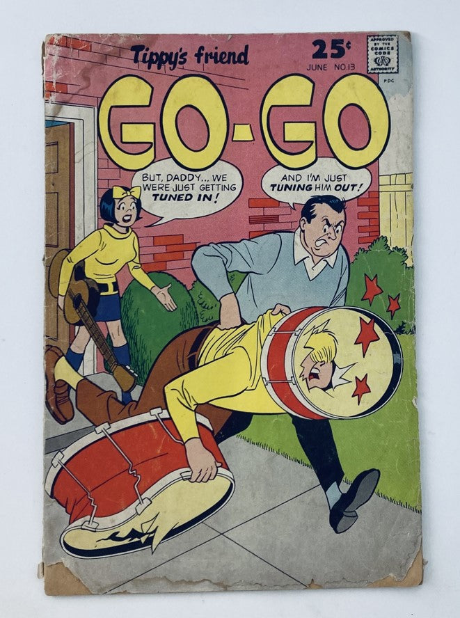 VTG 1966 Tippy's Friends Go-Go & Animal #13 comic book cover featuring colorful illustrations of characters in a humorous scene with a character in a drum and another character commenting, capturing the essence of the 1960s era.
