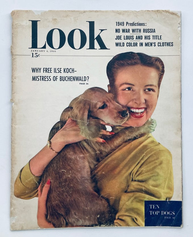 Cover of VTG Look Magazine January 4, 1949 featuring a woman with a dog, highlighting the issue's focus on Ilse Koch, Mistress of Buchenwald.