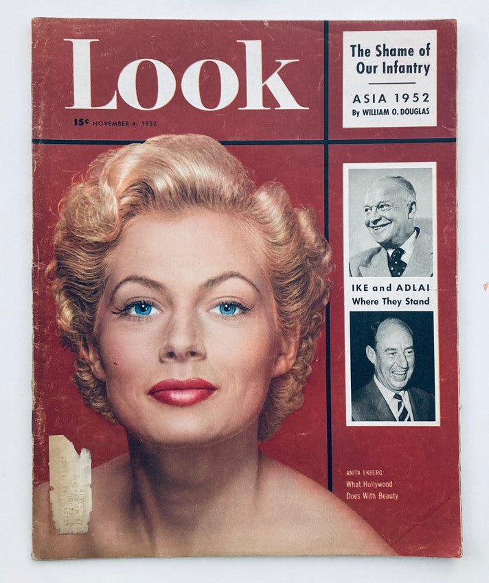Cover of Look Magazine from November 4, 1952, featuring a glamorous woman with blonde hair and vibrant blue eyes, showcasing the title and General Dwight D. Eisenhower in the issue.