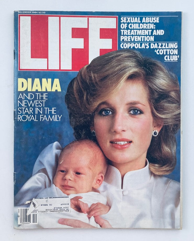 Cover of VTG Life Magazine, December 1984, featuring Princess Diana with a baby, titled 'Princess Diana & A Royal Prince.' Highlights royal family's dynamics and Diana's role as 'People's Princess.'