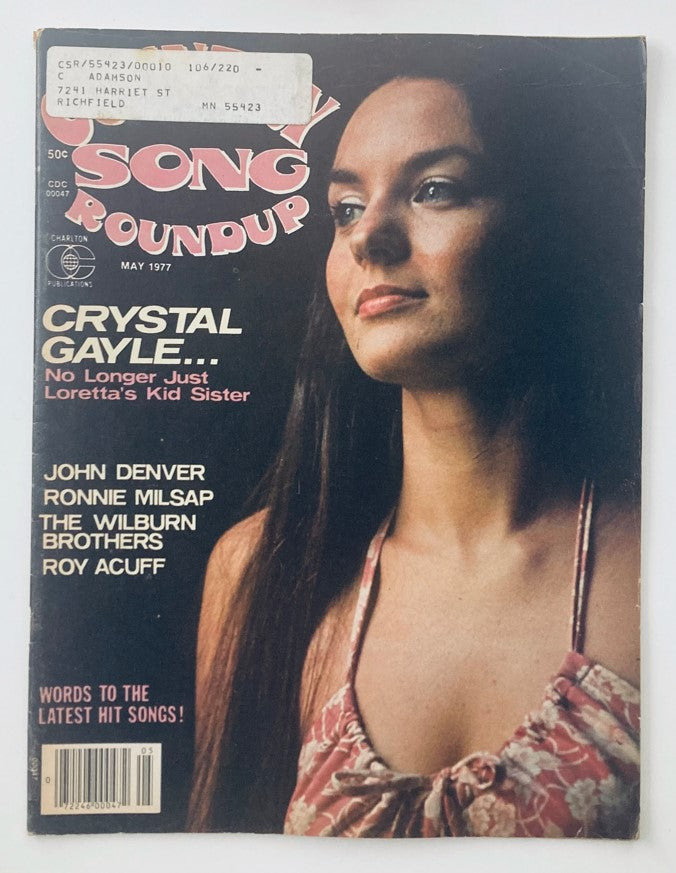 Cover of VTG Country Song Roundup Magazine May 1977 featuring Crystal Gayle and John Denver, showcasing a close-up portrait of Crystal Gayle in a floral dress.