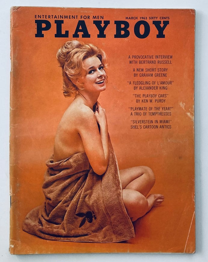 VTG Playboy Magazine March 1963 featuring Playmate Adrienne Moreau on the cover, showcasing retro style and vintage appeal.