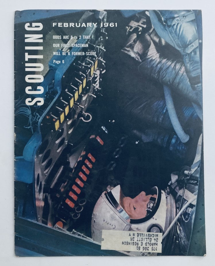 VTG Scouting Magazine February 1961 cover featuring astronaut Leroy G. Cooper Jr. with a detailed illustration of a space capsule cockpit.