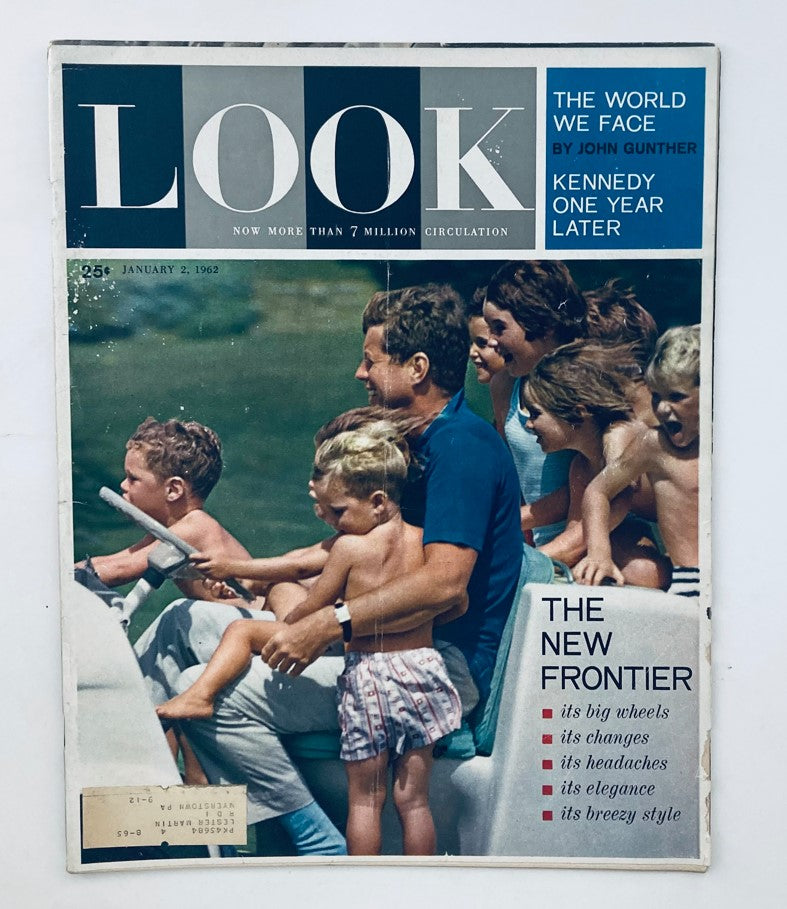 Cover of Look Magazine January 2, 1962, Vol 26 No. 1 featuring John F. Kennedy and his young sons, showcasing a vintage family scene.