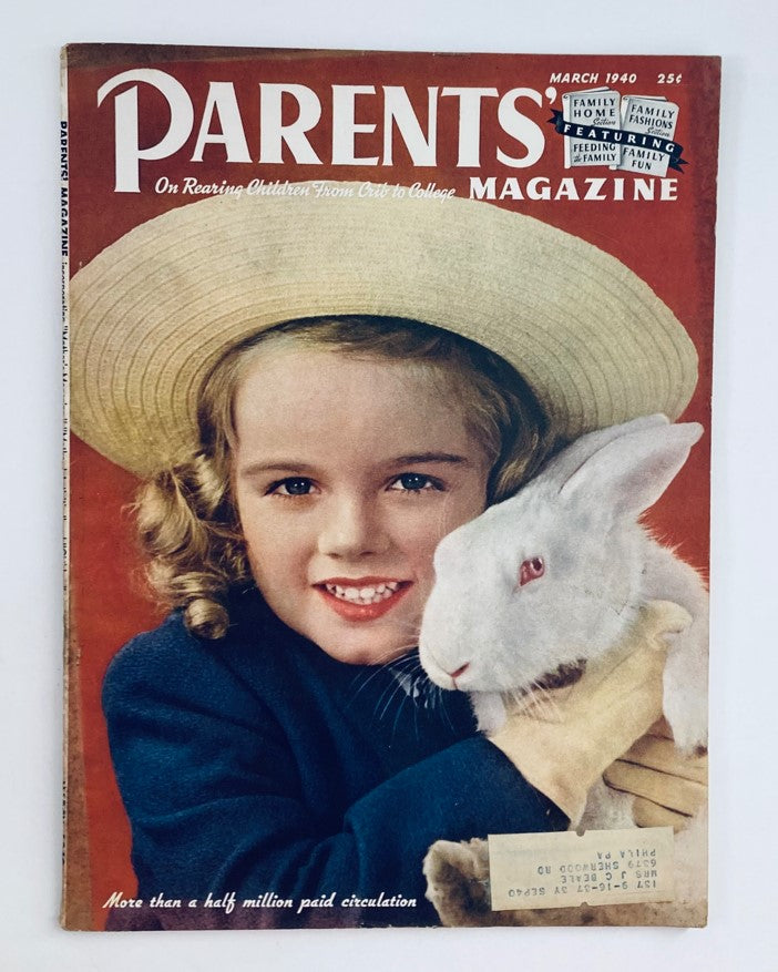 Cover of VTG Parents' Magazine March 1940 Vol 15 No. 3 How To Nurse Your Baby featuring a young girl holding a rabbit with a straw hat.