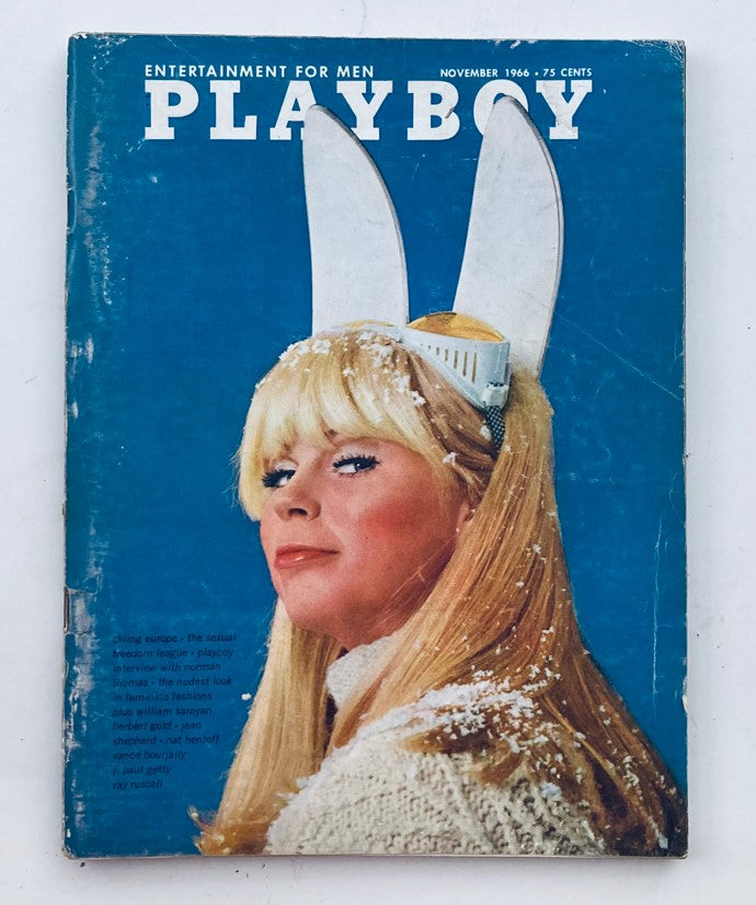 Vintage Playboy Magazine November 1966 cover featuring Playmate Lisa Baker with bunny ears, showcasing classic pin-up style.