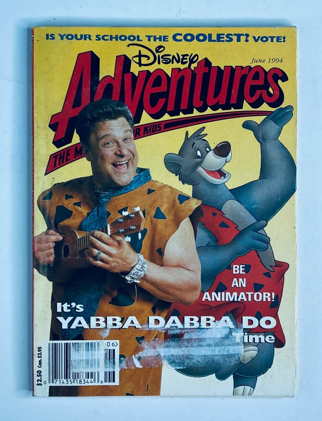 Disney Adventures Magazine June 1994 cover featuring John Goodman in a Flintstones costume holding a ukulele alongside a bear character. The magazine highlights an exclusive interview with Goodman and showcases themes of animation and nostalgia.