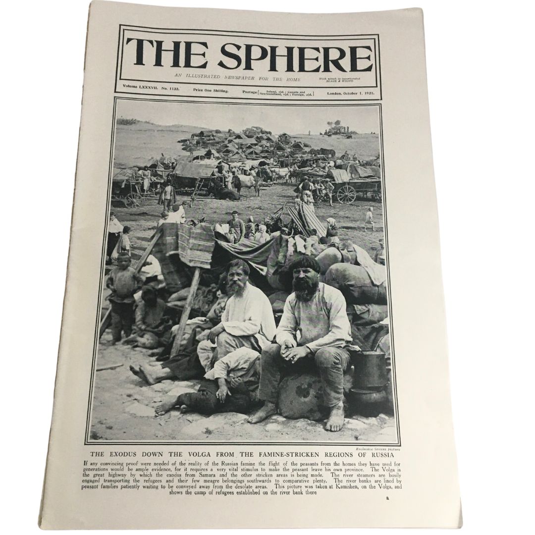 The Sphere Newspaper dated October 1, 1921, featuring a historical photograph depicting 'The Exodus Down the Volga from Russia', showcasing individuals amid a significant migration event.