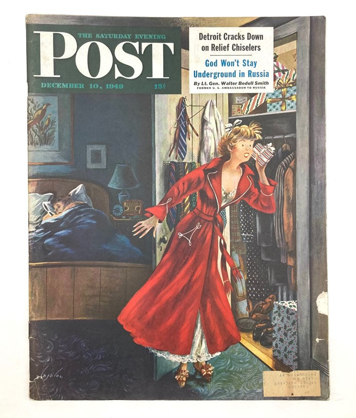 Saturday Evening Post Magazine Cover from December 10, 1949, featuring an illustrated cover by Alajalov, showcasing a woman in a red robe in a bedroom setting.