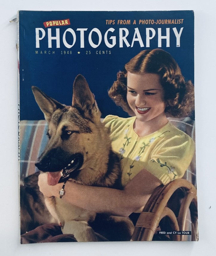 Cover of VTG Popular Photography Magazine March 1948 Vol 22 #3 featuring a woman with curly hair smiling while holding a German Shepherd dog.