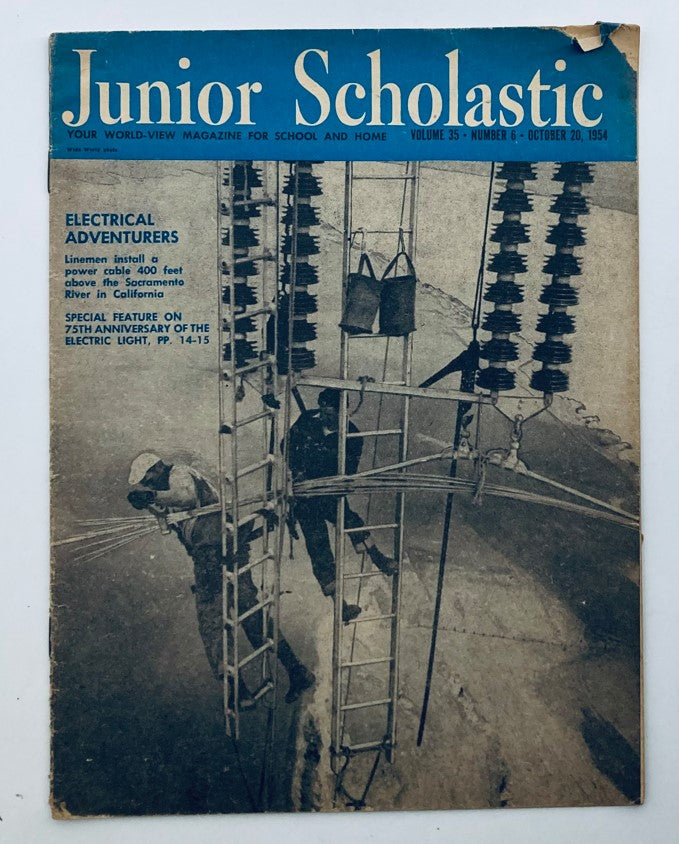 Cover of VTG Junior Scholastic Magazine from October 20, 1954, featuring the theme 'Electrical Adventures' with an image of linemen installing a power cable above the Sacramento River in California.