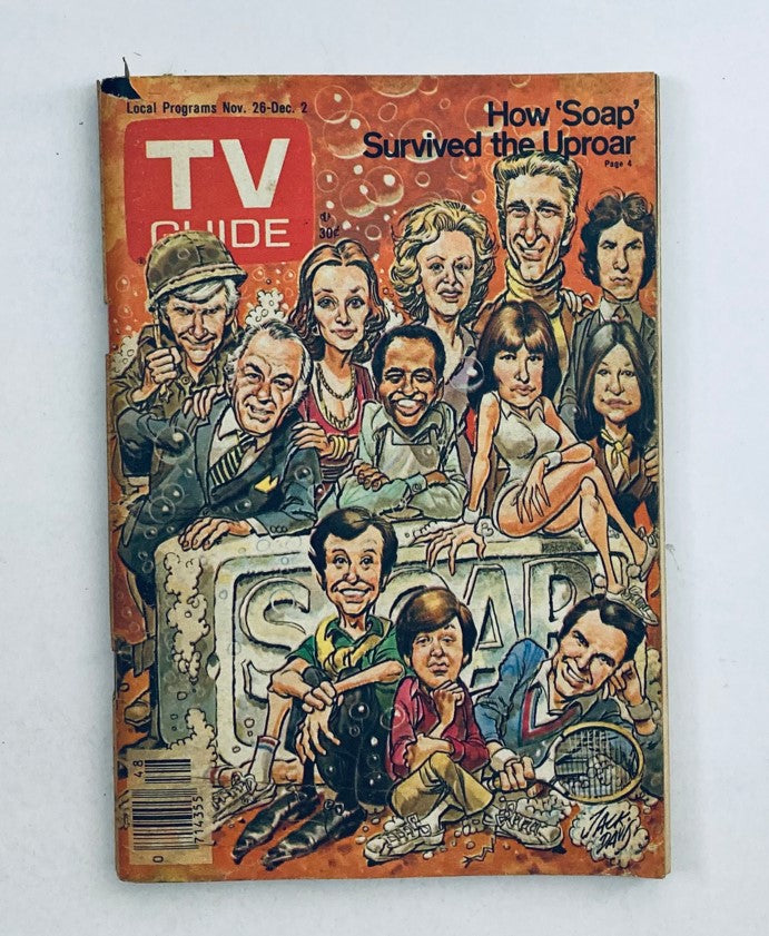 TV Guide Magazine November 26 1977 featuring the cast of Soap on the cover, illustrated with vibrant colors and characters depicted in a stylized manner.