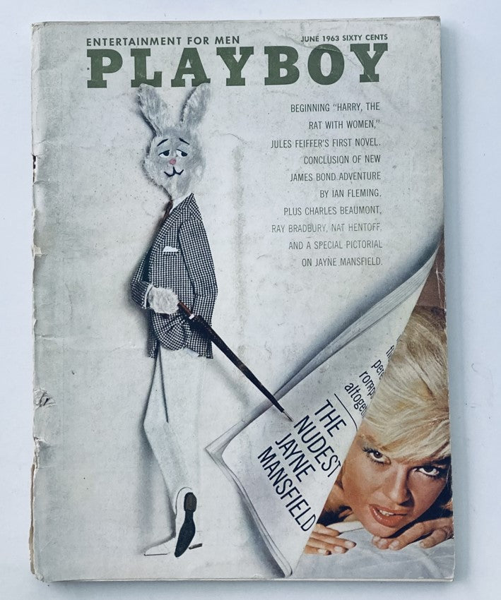 VTG Playboy Magazine June 1963 Cover featuring Jayne Mansfield with a playful rabbit illustration and a centerfold teaser. This collectible magazine showcases iconic 1960s aesthetics.