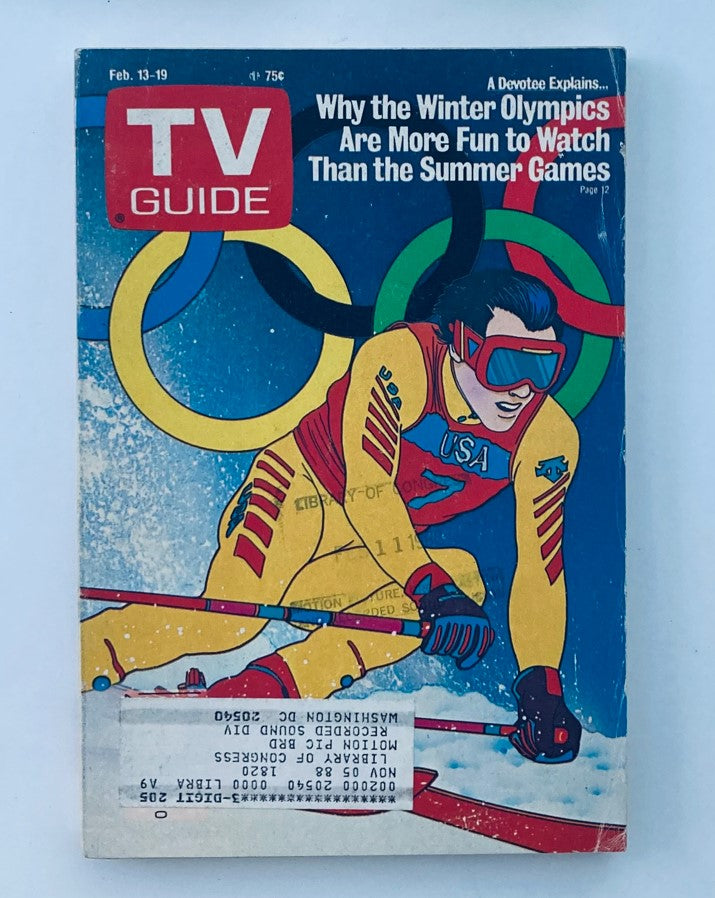 TV Guide Magazine February 13 1988 featuring the Winter Olympics, showcasing a skier with the USA emblem and Olympic rings in the background, emphasizing the excitement of winter sports.
