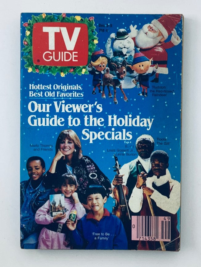 Cover of TV Guide Magazine December 3 1988 featuring LeVar Burton, showcasing a festive theme with holiday characters, including Santa Claus and reindeer, and the title 'Our Viewer’s Guide to the Holiday Specials.' An iconic collectible item from the late 80s.