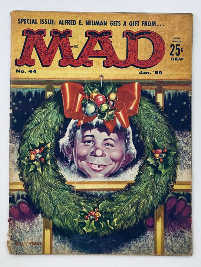 Cover of Mad Magazine January 1959 No. 44 featuring Alfred E. Neuman surrounded by a festive wreath, showcasing the humorous holiday theme of the vintage collectible.