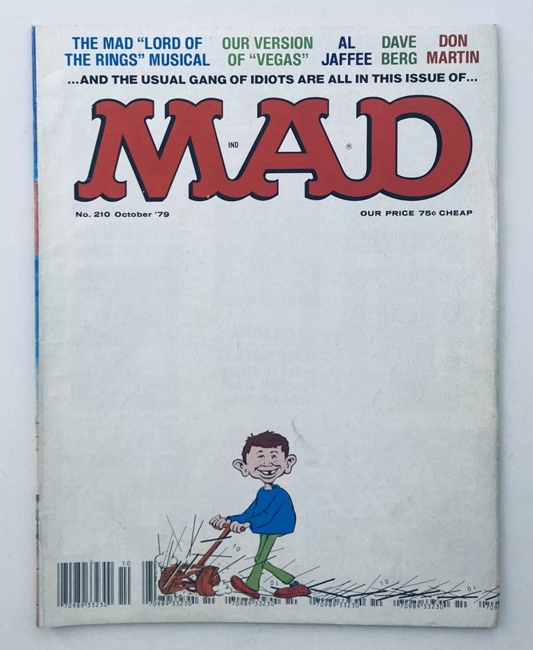 Cover of VTG Mad Magazine October 1979 No. 210 featuring 'The Mad Lord of the Rings Musical'. The cover showcases the iconic red 'MAD' title with a humorous illustration below of a character mowing grass, typical of the magazine's satirical style.