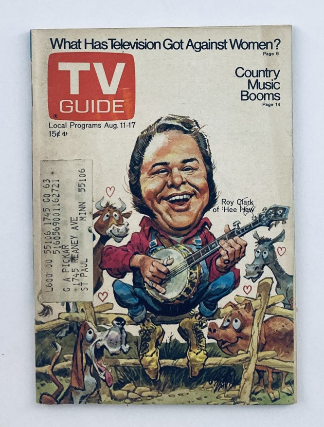 Cover of TV Guide Magazine August 11, 1973, issue number 563 featuring a cartoonish depiction of Roy Clark holding a banjo, surrounded by playful animals. This vintage magazine explores the Minneapolis-St. Paul TV scene and contributes to television history.