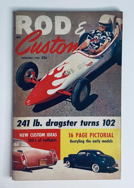 Cover of VTG Rod & Customs Magazine February 1959 featuring a 241 lbs Dragster with vibrant flames and a driver wearing a helmet, perfect for automotive enthusiasts.