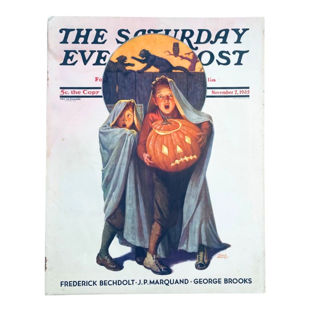 Cover of The Saturday Evening Post Magazine November 2 1935, featuring children in spooky costumes holding a jack-o'-lantern under a full moon, reflecting 1930s Americana.