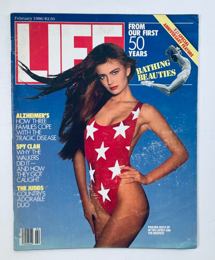 Cover of VTG Life Magazine February 1986 featuring Paulina Porizkova in a star-patterned swimsuit, showcasing the vintage style of the 1980s.