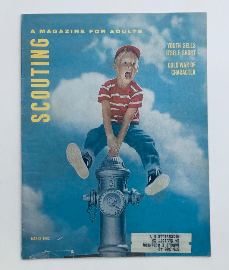 Cover of VTG Scouting Magazine March 1962 Vol 50 No. 3 featuring a child on a fire hydrant with the title 'Youth Sells Itself Short'. The bright blue sky and playful imagery reflect the themes of youth and scouting.