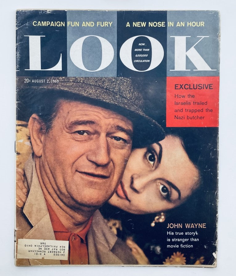 Cover of VTG Look Magazine August 2 1960 Vol 24 No. 16 featuring John Wayne and Pilar Wayne, showcasing vintage Hollywood glamour and culture.