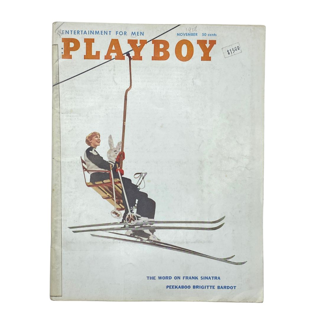 VTG Playboy Magazine November 1958 featuring a vintage cover illustration of a woman skiing with a rabbit, showcasing early iconic design in men’s entertainment magazines.