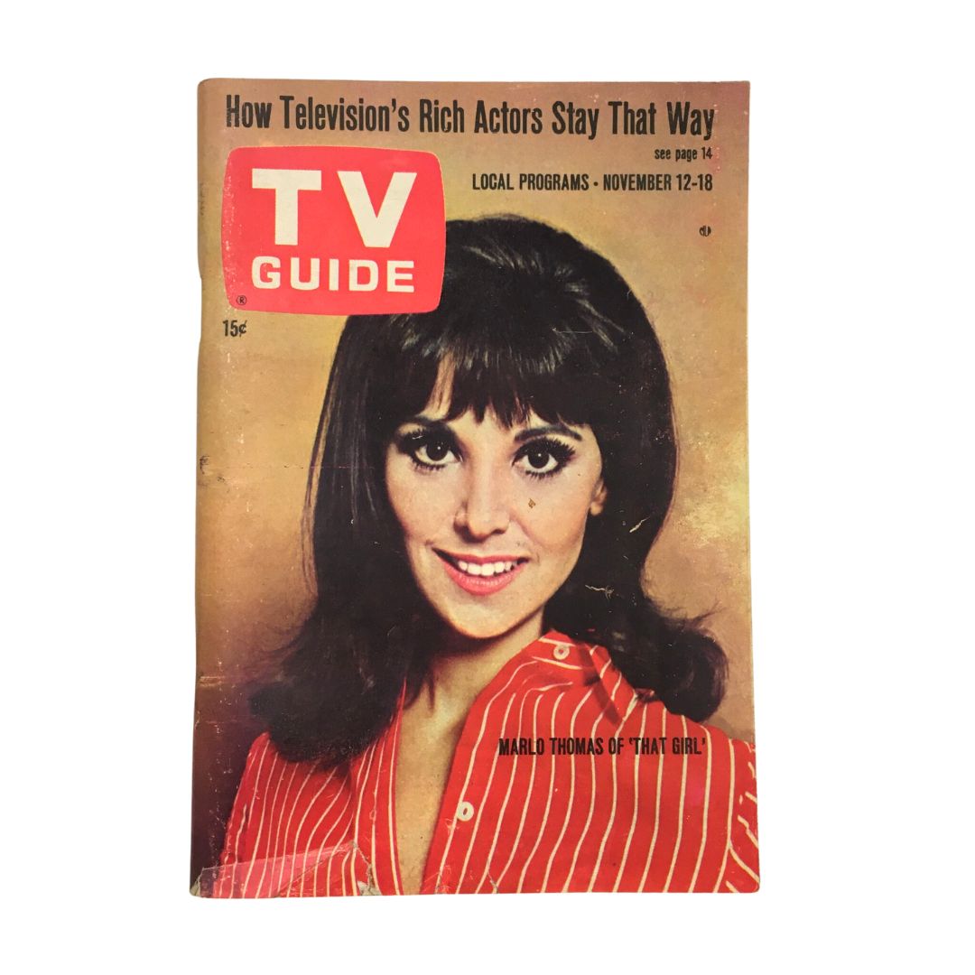 TV Guide November 12 1966 featuring Marlo Thomas from 'That Girl'. Vintage magazine cover showcasing a smiling Marlo Thomas in a red striped shirt.