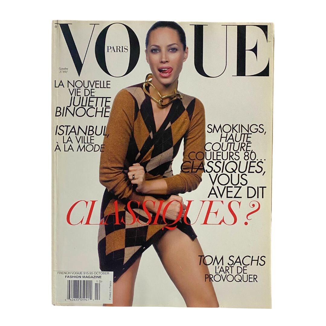 Cover of Vogue Paris Magazine October 2008 featuring a model in a stylish geometric patterned dress and bold accessories. This edition, showcasing Christy Turlington, is perfect for fashion collectors.