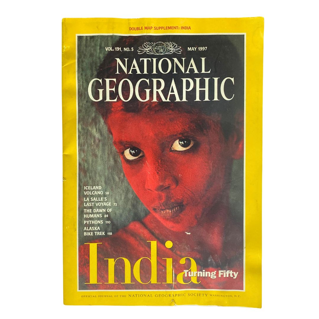 Cover of National Geographic Magazine May 1997 featuring a striking image related to India, celebrating India's 50th anniversary. The title prominently displays 'India Turning Fifty', and the magazine highlights notable articles within.