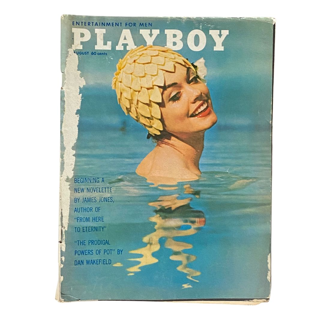Playboy Magazine August 1962 cover featuring a woman in a stylish swimsuit, radiating vintage charm and capturing the essence of the 1960s.