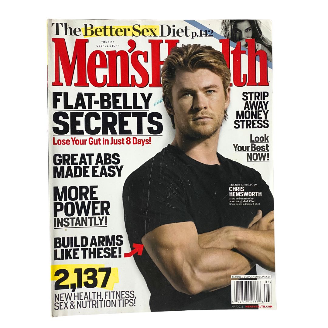 Men's Health Magazine May 2011 featuring Chris Hemsworth on the cover, showcasing fitness tips and health secrets with a focus on flat-belly secrets and building arms.
