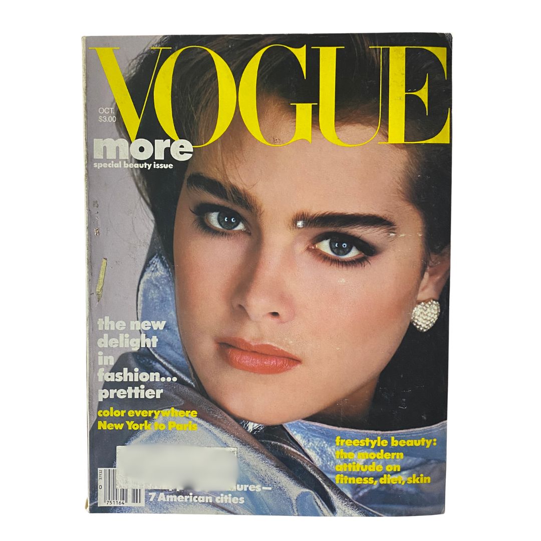 VTG Vogue Magazine October 1984 cover featuring Brooke Shields, photographed by Richard Avedon, highlighting 1980s fashion and beauty trends.