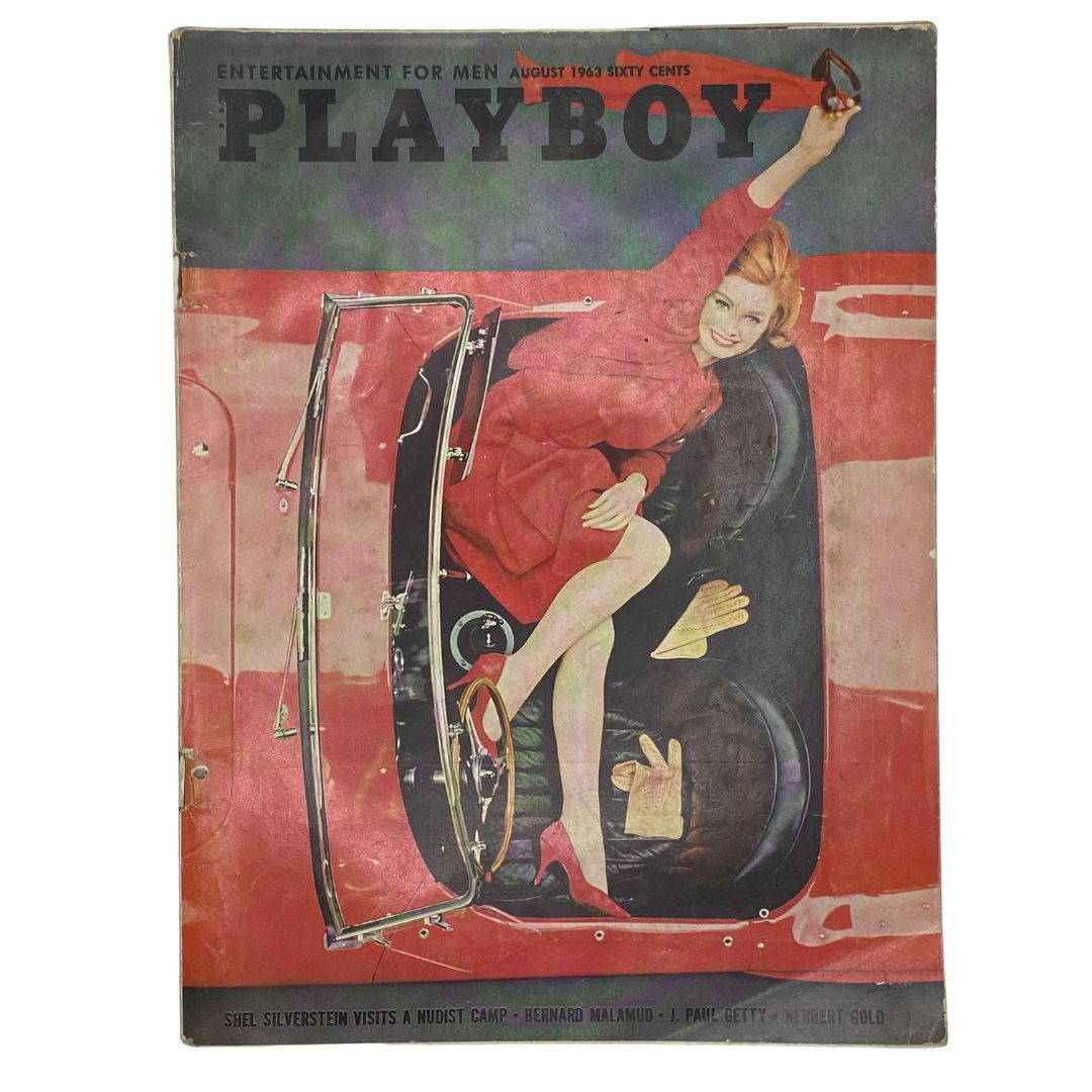 VTG Playboy Magazine August 1963 Cover featuring a glamorous woman in a vintage car, showcasing the iconic style and essence of early 1960s culture.