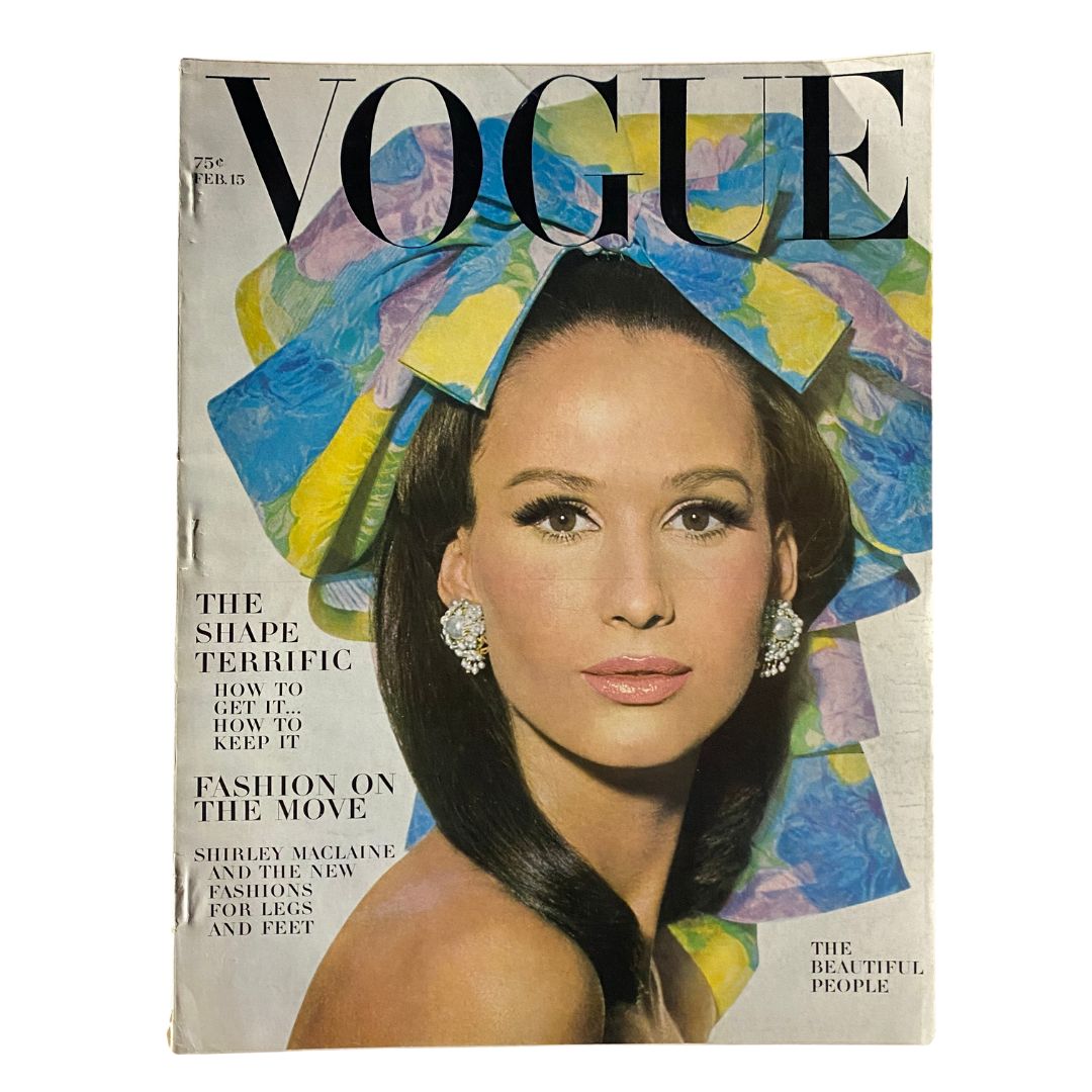 Vintage Vogue Magazine, February 15, 1964: Brigitte Bauer photographed by Irving Penn on the cover.