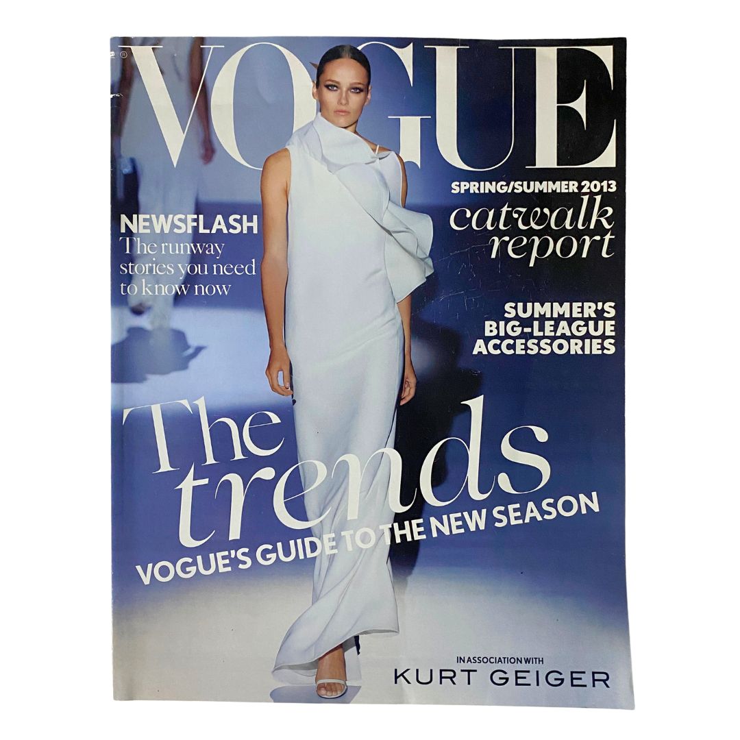 Vogue Magazine Supplement Spring/Summer 2013 featuring a model in a white gown, highlighting fashion trends and summer accessories.