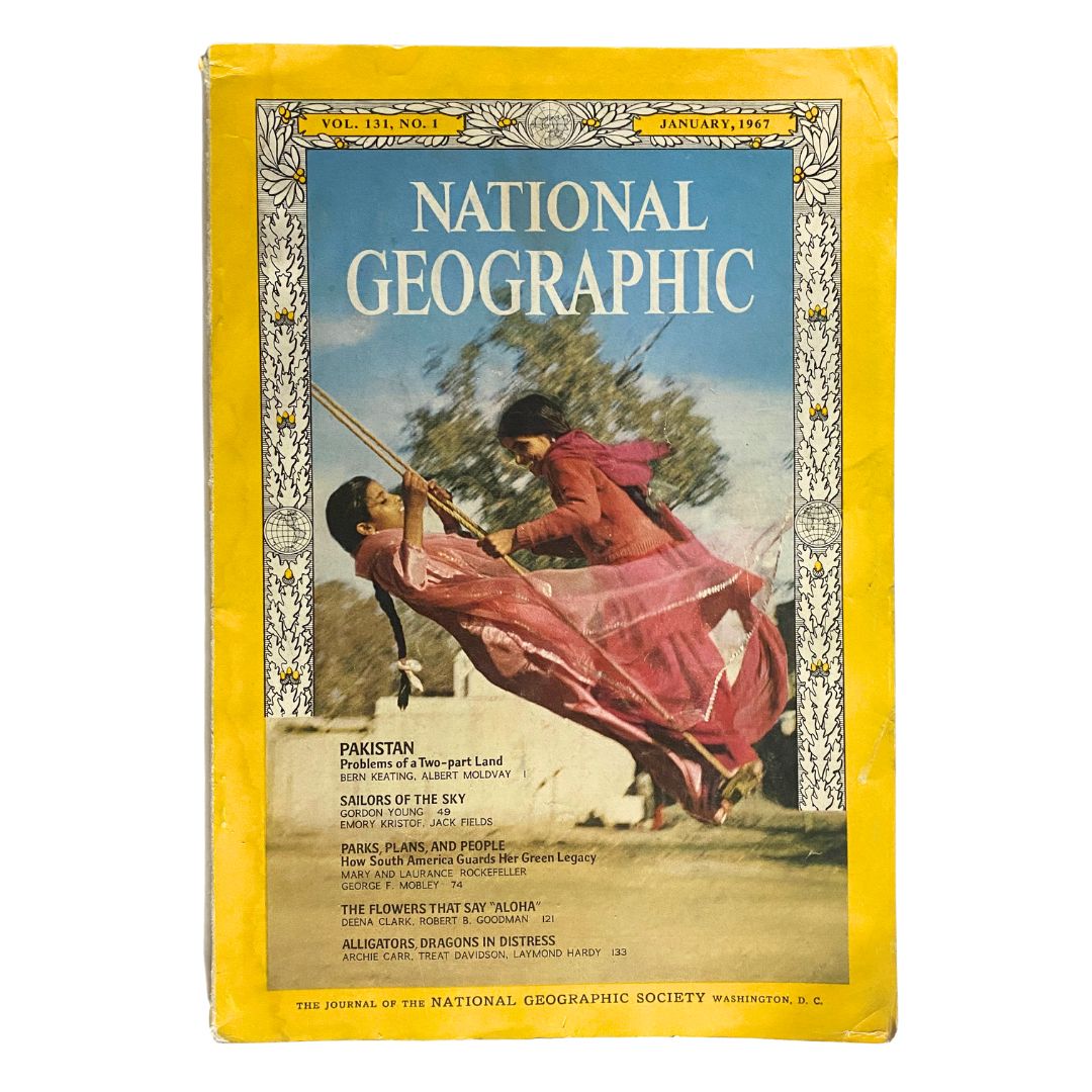 Cover of National Geographic Magazine January 1967 featuring vibrant photograph of two women in traditional attire playing on a swing; article explores Pakistan's culture and landscapes.