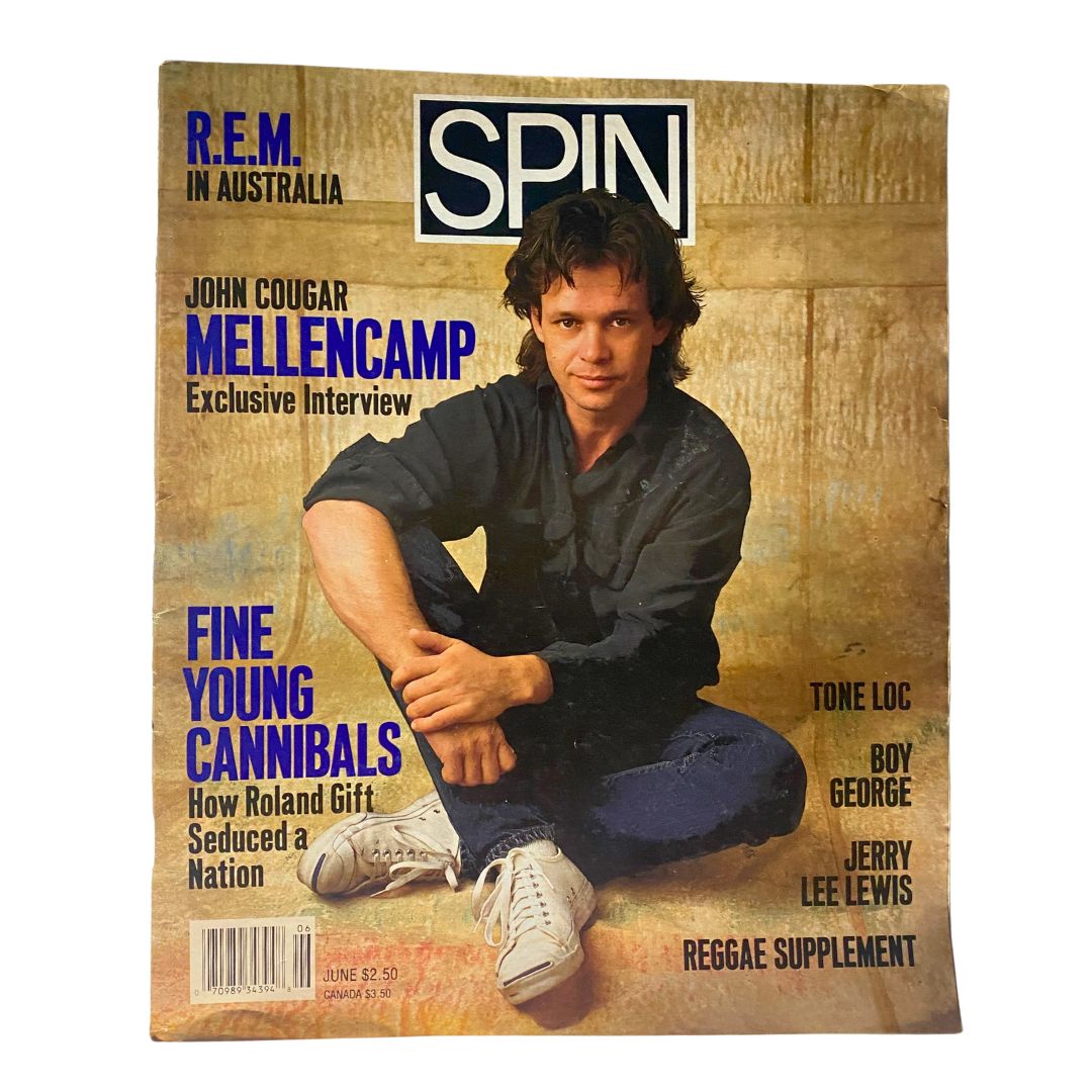 Spin Magazine June 1989 Vol 5 No. 3 featuring John Cougar Mellencamp on the cover. The magazine showcases an exclusive interview with Mellencamp and mentions other artists like R.E.M. and Fine Young Cannibals.