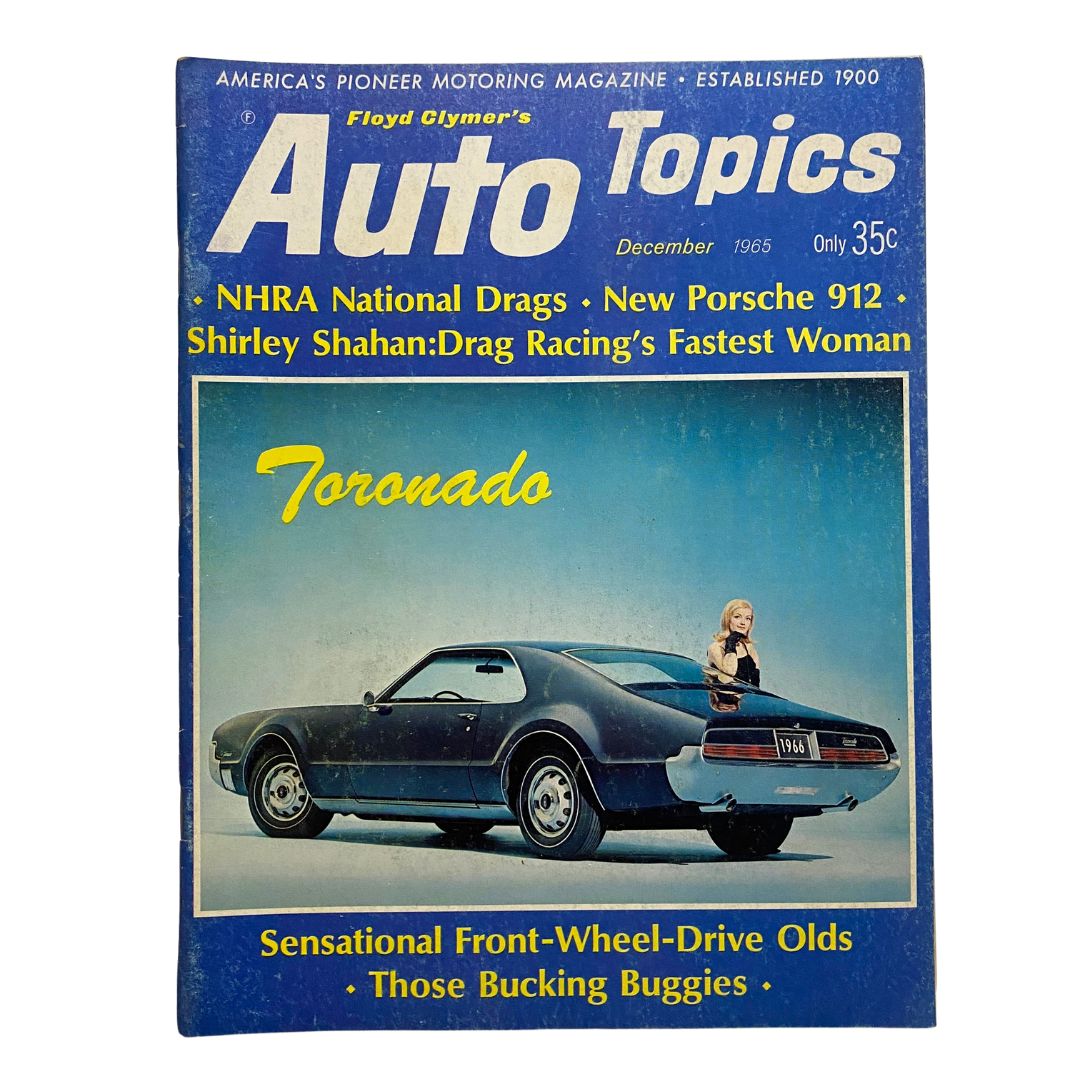 VTG Auto Topics Magazine December 1965 featuring the New Oldsmobile Toronado on the cover, showcasing classic automotive design and nostalgia.
