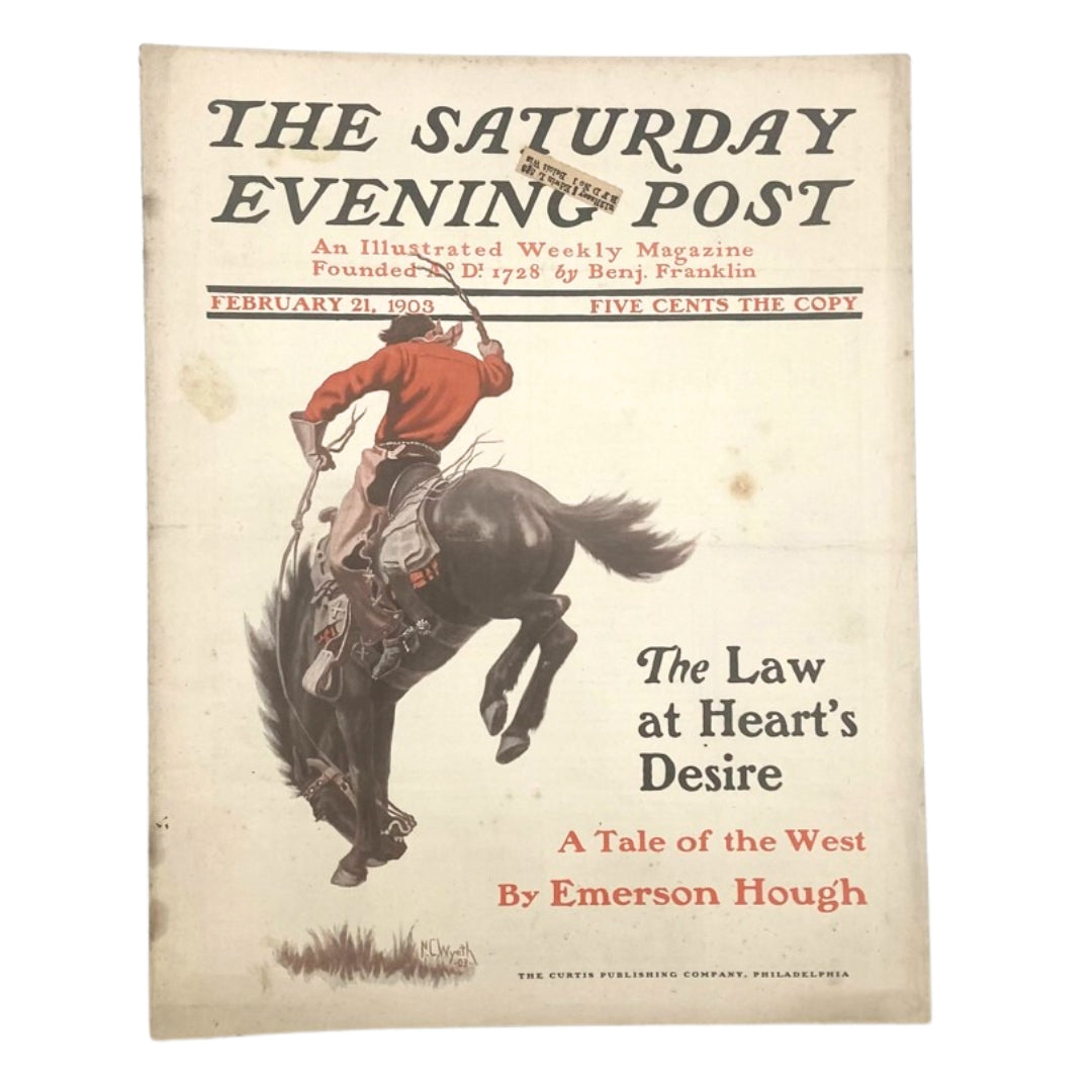 February 21, 1903 Saturday Evening Post cover titled 'The Law at Heart's Desire', featuring a cowboy riding a horse.
