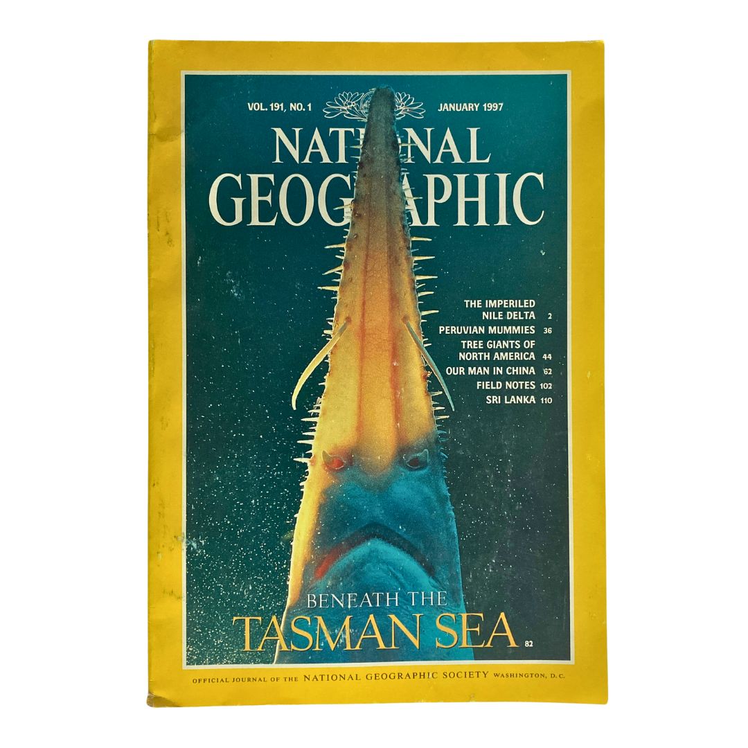 Cover of National Geographic Magazine January 1997 featuring the title 'Beneath the Tasman Sea' with an image of a Tasmanian shark and vibrant blue background.